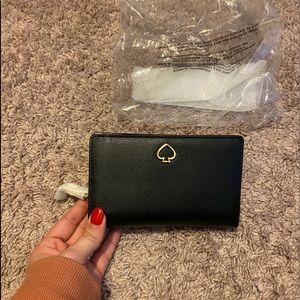 NWT Kate Spade Adel medium bifold wallet